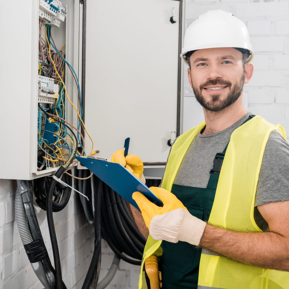 smiling-handsome-electrician-holding-clipboard-nea-2024-11-18-03-53-17-utc (1)